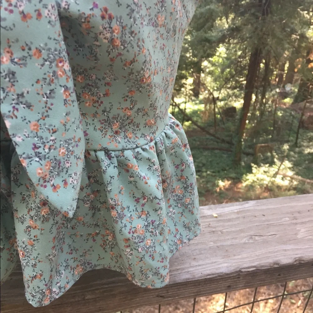 Breezy baby doll camisole in pale green floral peplum floral corset top - Picture 3 of 7